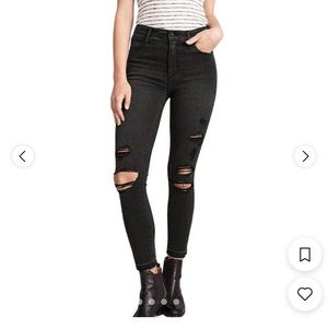 Abercrombie & Fitch black ripped high-rise, super skinny jeans.